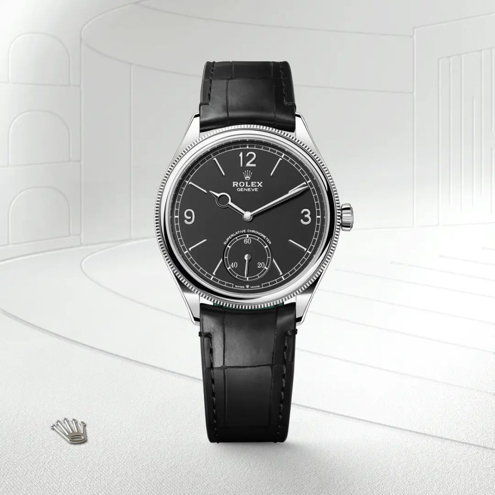 Rolex 1908 in 18 ct white gold with a Intense black dial, Domed and fluted bezel, Leather strap bracelet