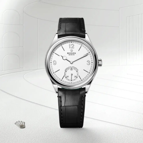 Rolex 1908 in 18 ct white gold with a Intense white dial, Domed and fluted bezel, Leather strap bracelet