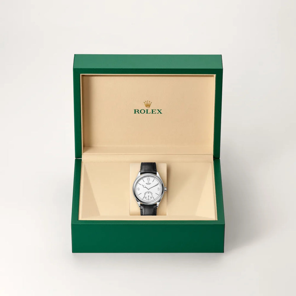 Rolex 1908 in 18 ct white gold with a Intense white dial, Domed and fluted bezel, Leather strap bracelet