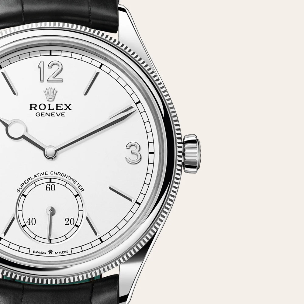 Rolex 1908 in 18 ct white gold with a Intense white dial, Domed and fluted bezel, Leather strap bracelet