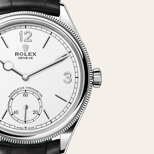 Rolex 1908 in 18 ct white gold with a Intense white dial, Domed and fluted bezel, Leather strap bracelet