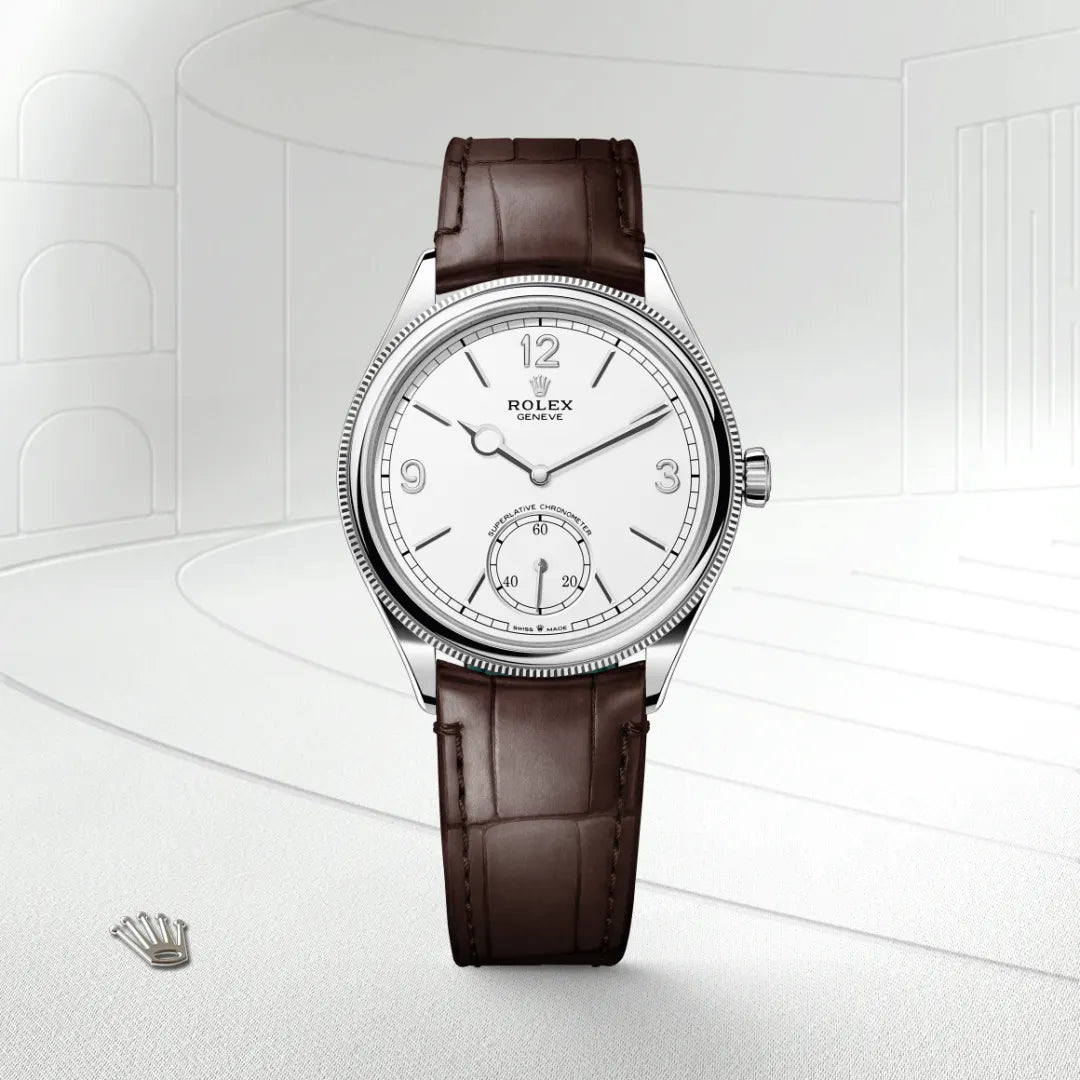 Rolex 1908 in 18 ct white gold with a Intense white dial, Domed and fluted bezel, Leather strap bracelet