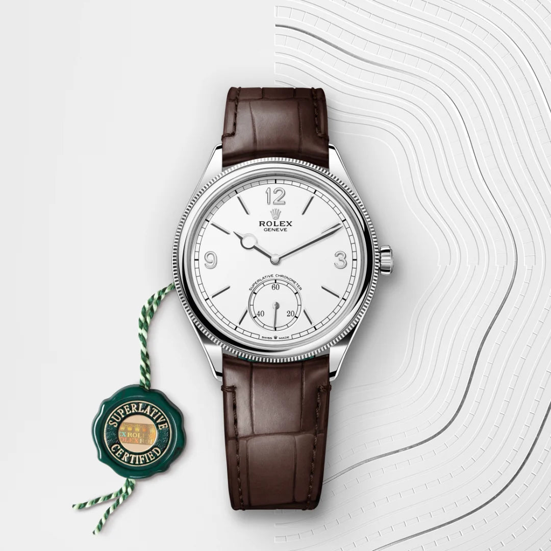 Rolex 1908 in 18 ct white gold with a Intense white dial, Domed and fluted bezel, Leather strap bracelet