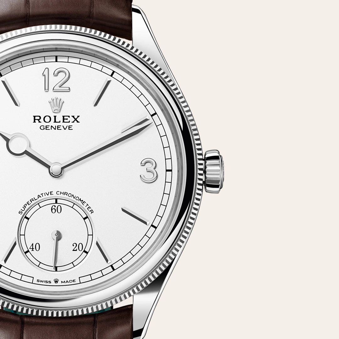 Rolex 1908 in 18 ct white gold with a Intense white dial, Domed and fluted bezel, Leather strap bracelet
