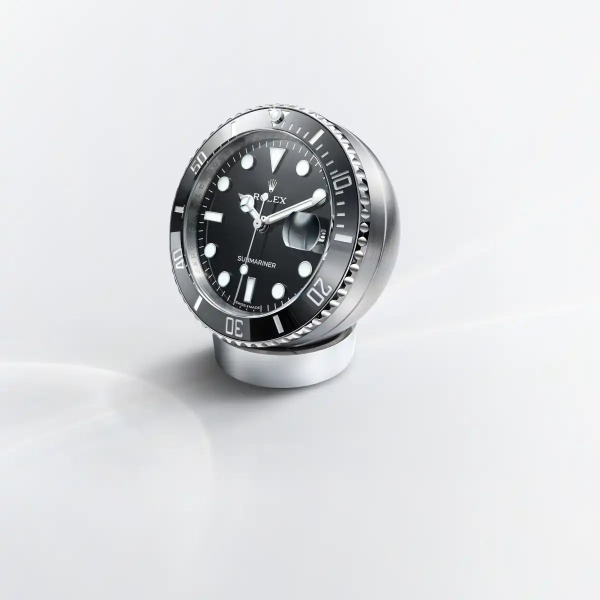 Rolex Submariner Date desk clock in Stainless steel with a Black lacquer dial, Fixed 60-minute graduated, scratch-resistant Cerachrom insert in black ceramic bezel, c909010ln-0001 at Michael Spiers